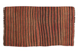 Vintage Turkish Kilim rug with varied striped pattern in brick red, brown, and charcoal.