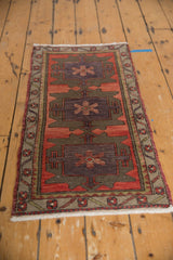 Vintage Oushak runner side border: meandering floral, dusty brick red, aubergine, olive, fringe.