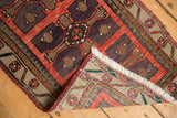 Hand-knotted foundation and original ivory fringe of a vintage distressed Oushak rug.