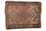 Vintage distressed Oushak mat with triple geometric gul design in blush, bronze, and ivory, 2'1