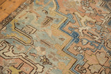 Faded apricot, pale blue vinery, and distressed wear on a vintage Mehrivan rug.