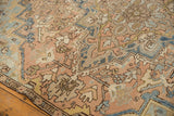 Vintage Mehrivan rug with distressed low pile and apricot, blue floral vinery.