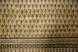 Distressed vintage Mir Sarouk carpet shows navy Boteh germinating seeds and geometric border.