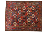 Vintage Bakhtiari carpet, allover panel garden motif, madder red, cobalt blue, charcoal, and ivory. 7'2