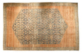 Distressed antique Persian Bibikabad carpet, pale copper field with intricate Herati-gul medallion, 12'7