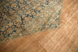 Distressed pale copper border and zig-zag edge on antique Bibikabad rug.