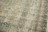 Traditional Sivas rug showing textured wear, scrolling vinery, and softened floral designs in beige and blue.