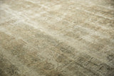 Textured pile and faded traditional patterns on a distressed vintage Sivas carpet.