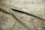 Textural detail of vintage distressed Sivas carpet, highlighting muted tones.