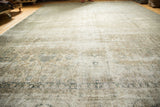Distressed texture of the vintage Sivas carpet, showing faded patterns and time-softened tones.