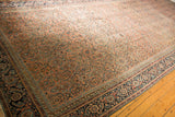 Low pile antique Karabagh carpet field in pale plum Herati motif, with navy Mahi Mahi border.