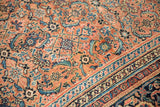 Low pile Herati field meets Mahi Mahi and turtle border on an antique Karabagh carpet.