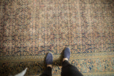 Distressed texture of antique Khorassan rug with faded Herati and Mahi Mahi motifs.