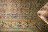 Time-softened Mahi Mahi border and Herati field pattern on an antique Khorassan carpet.