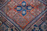Traditional Joshegan paneled lattice, finely knotted, with cherry red, navy blue, ivory motifs.
