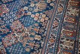 Fine weave Joshegan carpet border, navy, cherry red, beige stylized motifs, and patina.