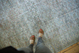Worn pile of antique distressed Khorassan runner with faded ivory and ocean green Herati motif.