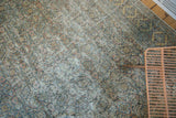 Field of a distressed antique Khorassan runner, revealing its Herati motif and worn texture.