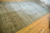 Varied pile texture from mostly even wear on the antique Khorassan runner's muted Herati motif.