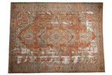 Antique distressed Karaja carpet with concentric medallions in copper and silver tones and heavy, allover wear.
