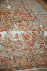 Worn pile and distressed texture on an antique Karaja carpet with copper and silver motifs.