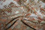 Distressed Karaja carpet detail showing low pile worn to knot heads in soft copper and silver tones.