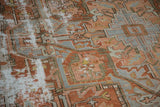 Distressed antique Karaja carpet with worn copper and silver pile revealing the ivory foundation.