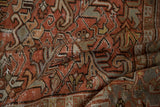Faded brick red distressed Mehrivan carpet, sharply contoured serrated leaf pattern with silver.