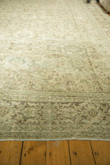 Fringe and lower border of distressed Mahal carpet; ivory, pale green floral vinery.