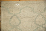 Textured detail of the ivory hand-woven Kilim with pale grey Moroccan vine pattern.