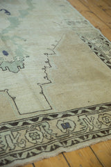 Distressed Oushak runner border, showing meandering serrated leaf and flower motifs.