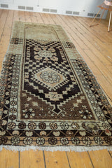 Quatrefoil medallion and blossomed floral designs on this distressed Oushak runner.