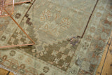 Distressed Oushak runner pile detail with visible foundation, muted beige, brown, and purple hues.