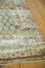 Distressed vintage Malayer runner with worn ocean green boteh and time-softened beige tones.