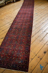 Plush ruby red Engelas runner pile showcasing intricate Herati motif and gem tones.
