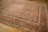 Antique Mahal carpet corner: terra cotta field of lattice plants, blue and blush borders.