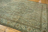 Distressed vintage Malayer carpet featuring Herati motif in denim blue, beige, and soft madder.
