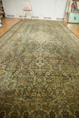 Soft Herati pattern on vintage Malayer carpet with muted denim blue and sand.