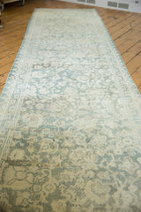 Distressed texture of the vintage cotton Agra runner with silver, blue, and ivory floral motif.