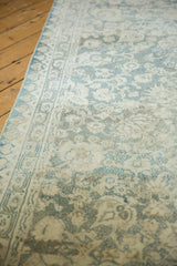 Vintage distressed Cotton Agra runner, featuring faded dusty powder blue floral motifs and low pile.