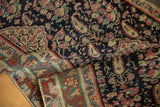 Antique Malayer runner, geometric border, navy field, henna plant motifs, knot head wear.