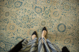 Distressed vintage Tabriz carpet, allover faded blue floral palmettes and vinery on ivory.