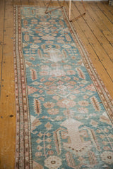 Vintage Distressed Malayer runner featuring faded dusty blue, antique ivory, and sand patterns.