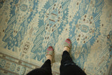 Antique style fine weave Soumac carpet with ivory and slate blue elongated medallions.