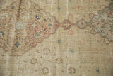 Distressed Sivas carpet with pale rose floral motifs and even knot head wear.