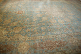 Worn sapphire blue field with scrolling vinery beside distressed dusty wine cartouche border.