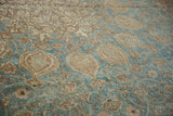 Faint foundation showing on distressed Tabriz carpet, sapphire blue and beige vinery.