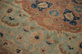 Distressed texture of oversized seafoam green serrated leaves and pale rust motifs.