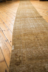 Vintage distressed Hamadan runner with textured pile, pronounced abrash, and subtle Herati pattern.