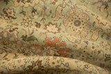 Distressed vintage Tabriz rug with worn seafoam green pile, beige and terra cotta vinery.